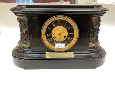 Lot 2550 - Victorian slate mantel clock, with bronze relief-decorated panels of classical figures on either side, gilt dial, and presentation plaque beneath dated 1877, 45cm across x 26cm high