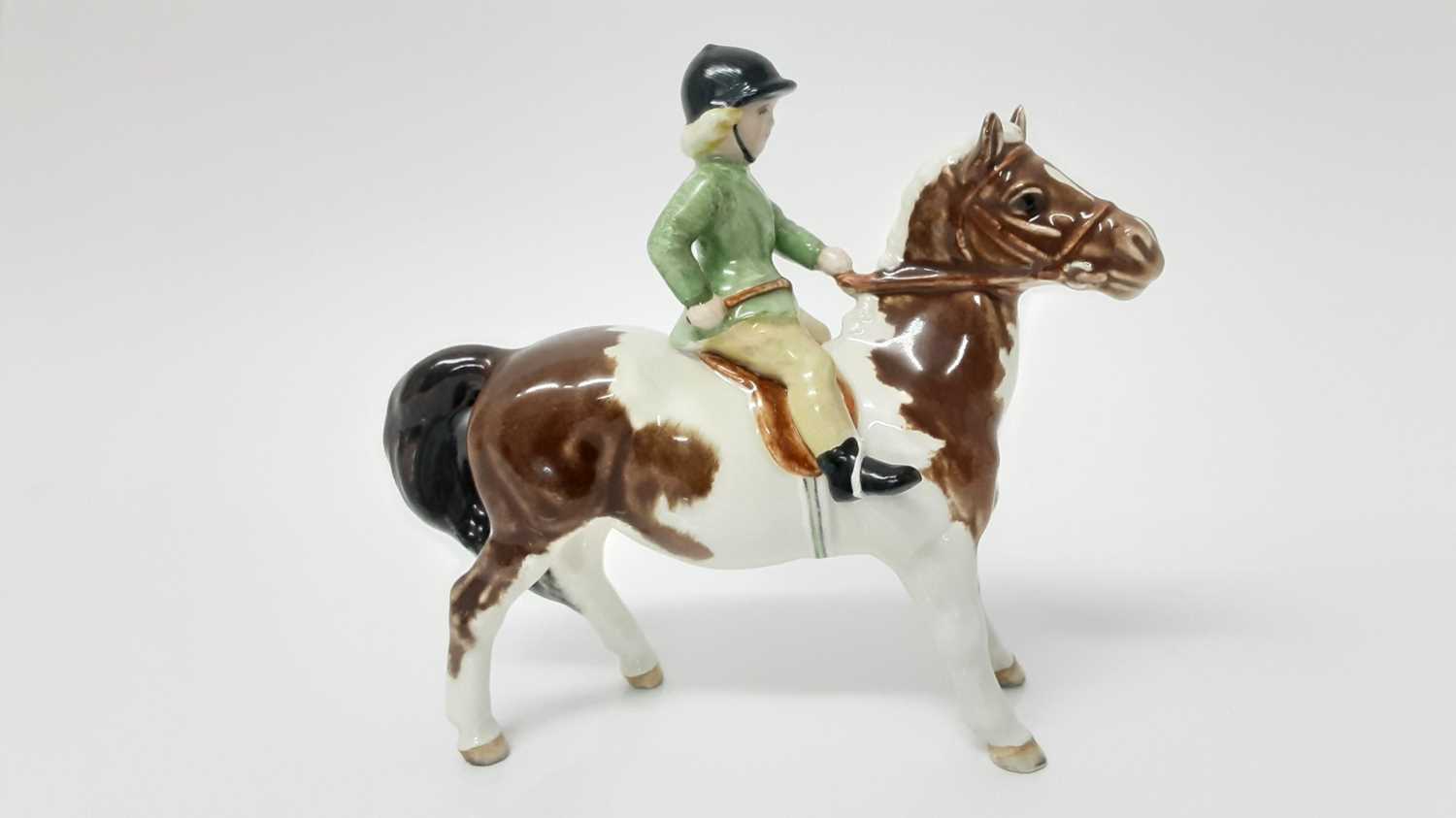 Lot 14 - Beswick Girl on Pony, model no. 1499,