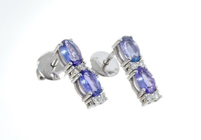 Lot 449 - Pair of tanzanite and diamond earrings