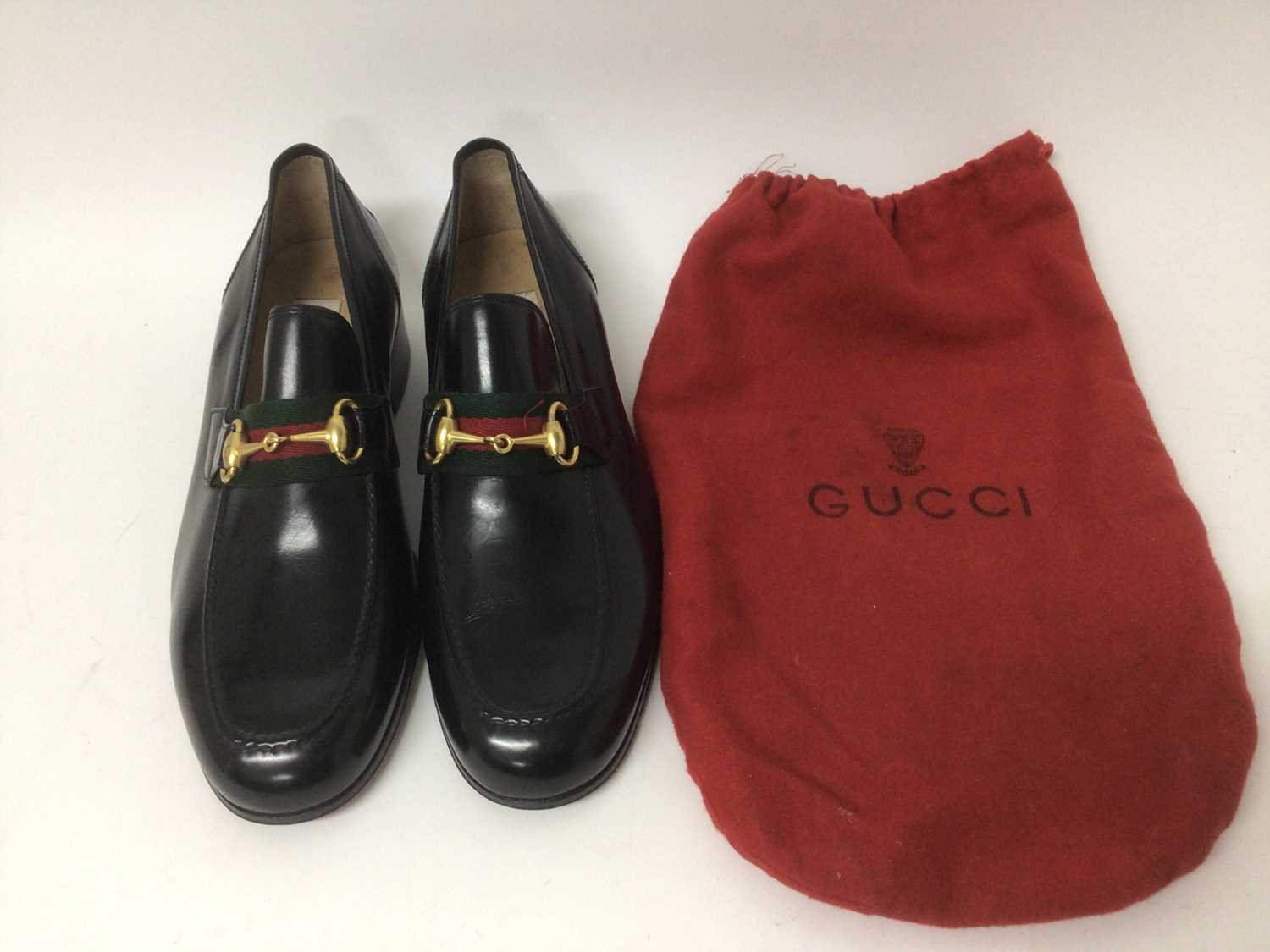 Lot 2173 - Gucci Mens Shoes. A pair of black Horse Bit Loafers size 42 . In Gucci soft red bag. Unworn.