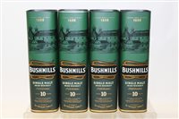 Lot 1310 - Whisky - four bottles of Bushmills Single Malt...