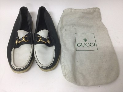 Lot 2175 - Guccmens shoes.  A pair of navy and white Horse Bit loafers. Size 42 1/2 . Pre-worn but in good condition. Soft white and green Gucci bag,the bag is soiled.