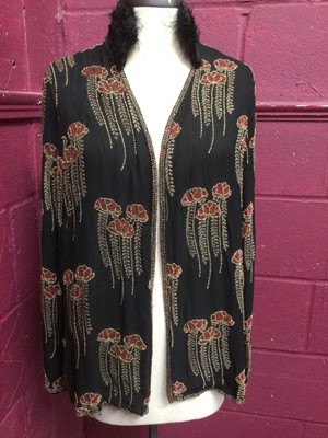 Lot 2183 - 1920's/30's Liberty & Co London black crepe silk Art Deco beaded evening jacket.