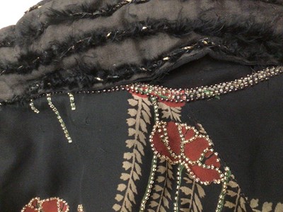Lot 2183 - 1920's/30's Liberty & Co London black crepe silk Art Deco beaded evening jacket.