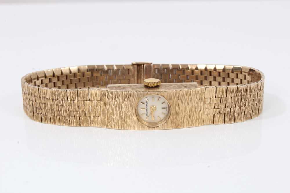 Lot 319 - Bueche- Girod 9ct gold ladies wristwatch on bark effect bracelet, in original case