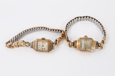 Lot 320 - Two vintage ladies Dogma 18ct and 9ct gold cased wristwatches, both on expandable gold plated bracelets