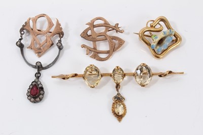 Lot 324 - Group antique and later brooches to include two yellow metal monogram brooches, topaz three stone bar brooch and 15ct gold enamelled flower brooch (4)