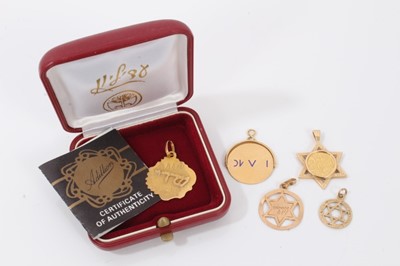 Lot 328 - Group of five gold Jewish pendants to include 14ct gold, 9ct gold and yellow metal Star of David pendants, Israel medallion and disc pendant in 18ct gold mount