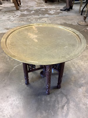 Lot 2562 - Eastern brass tray topped Benares table