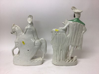 Lot 53 - Two Victorian Staffordshire pottery figures
