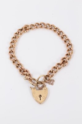 Lot 24 - 9ct gold curb link bracelet with padlock clasp