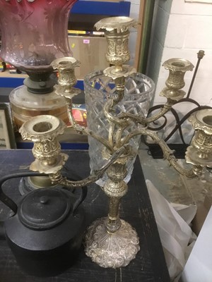 Lot 149 - Brass oil lamp with glass shade, together with a Queen Anne style candelabra, iron kettle