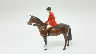 Lot 71 - Beswick Huntsman (style two) model no. 1501, designed by Arthur Gredington, 21cm, together with three hounds and a fox (5)