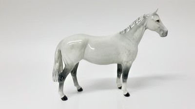 Lot 73 - Beswick Arab "Xayal" model no. 1265, designed by Arthur Gredington, 16cm high, together with another horse (2)