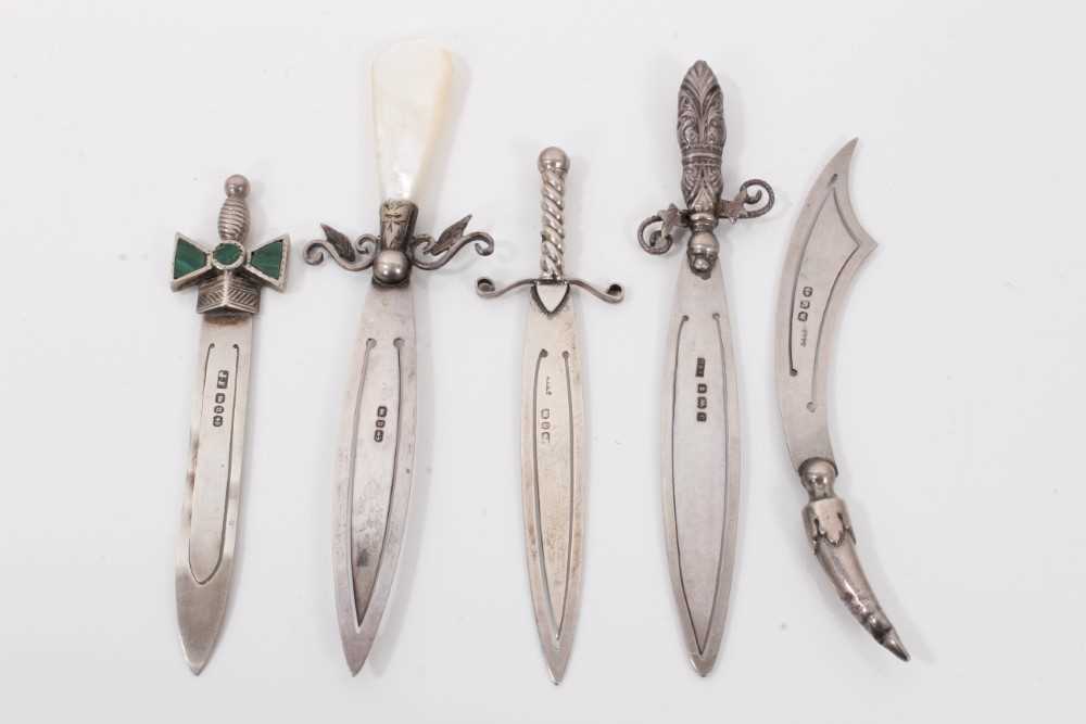 Lot 32 - Five silver bookmarks all in the from of swords/knives including one mounted with malachite and one with a mother of pearl handle