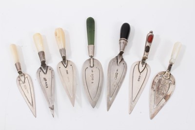 Lot 34 - Seven silver trowel bookmarks including four with mother of pearl handles, one green hard stone and two others