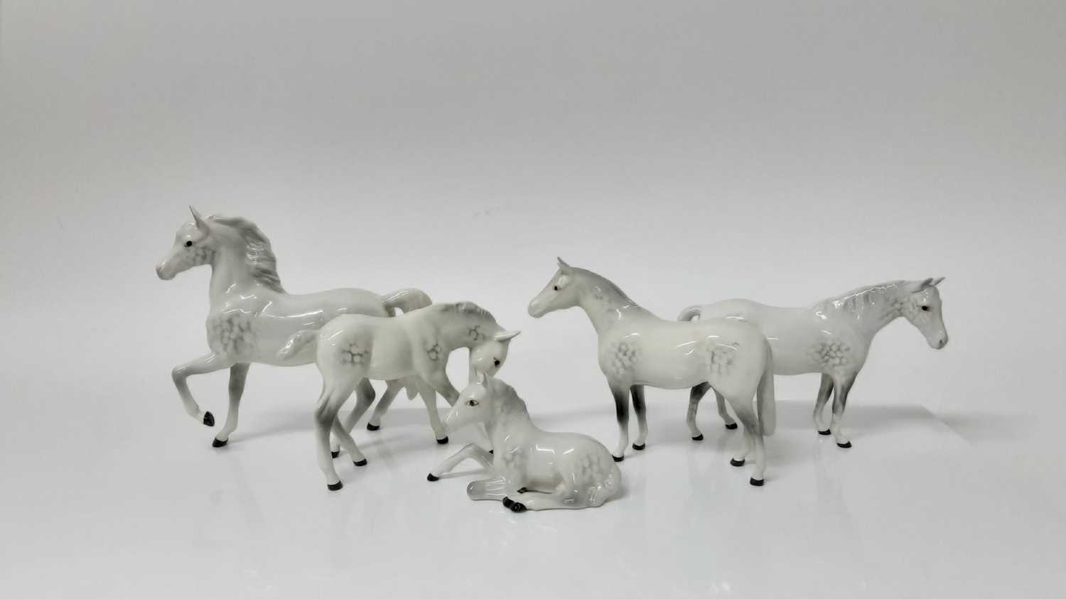 Lot 76 - Five various Beswick horses including Foal (lying) model no. 915, designed by Arthur Gredington, 8cm high