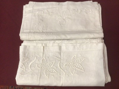 Lot 2191 - Two large white linen tablecloths with substantial and deorative white thread embroidery (210 x 230 cms approimately)