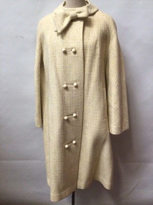 Lot 2193 - 1960's cream wool coat with bow at neckline.  Light fawn wool coat c.1970's, vintage otterburn Tweed skirt, 1950's/60's brown boucle wool skirt suit.  Plus a mulberry and pink check dress.