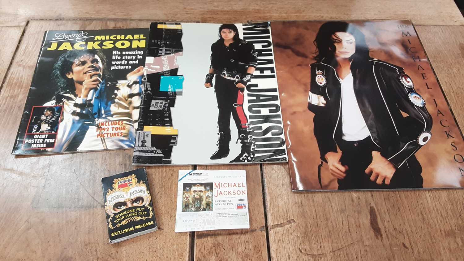 Lot 127 - Michael Jackson and Status Quo concert tickets and T Shirts