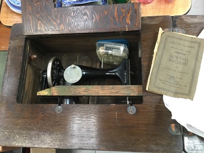 Lot 439 - 1930's Oak cased singer sewing machine table