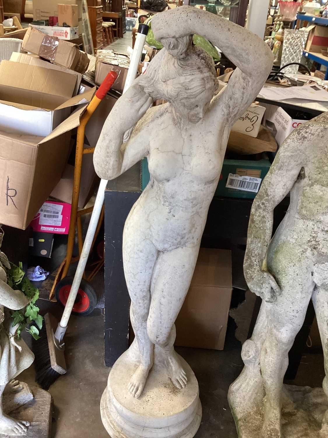 Lot 1031 - Concrete garden statue of a naked lady
