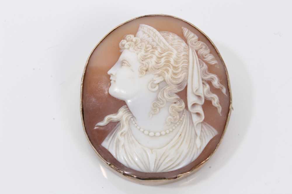 Lot 76 - Finely carved shell cameo depicting Greek Goddess Hera within brooch mount