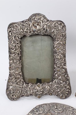 Lot 81 - Group of five silver photograph frames, brushes and mirror