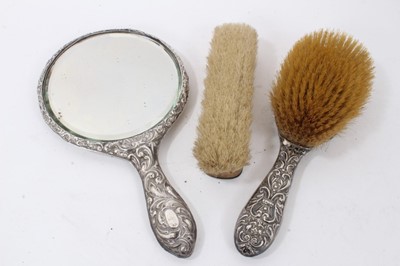 Lot 81 - Group of five silver photograph frames, brushes and mirror