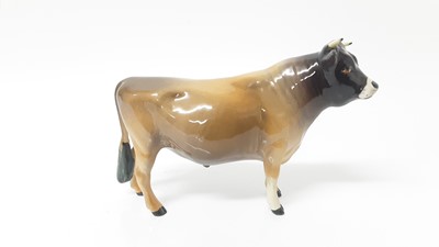 Lot 93 - Beswick Jersey Cow - CH Newton Tinkle, model no. 1345, designed by Arthur Gredington, 10.8cm high, together with Guernsey Cow, and Bull plus a Limousin calf(4)
