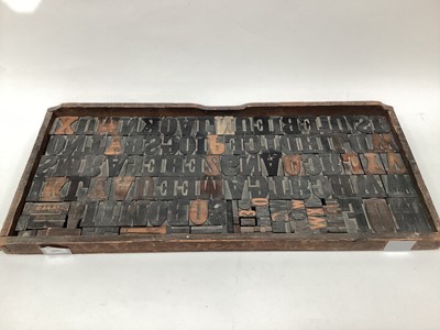 Lot 2601 - Collection of old wooden printing blocks in a large wooden tray