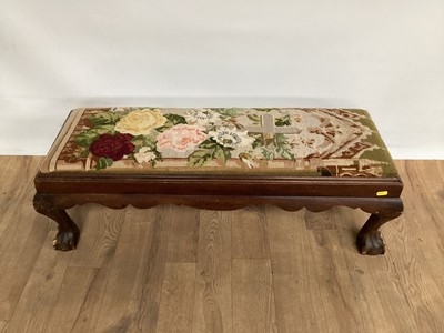 Lot 1030 - 1920s long footstool with needlework top, on carved claw and ball feet