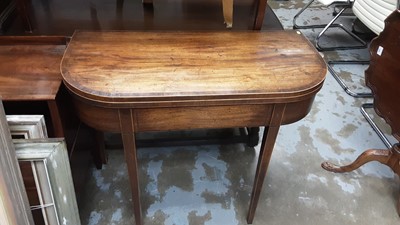 Lot 995 - George III mahogany D-shaped card table with crossbanded fold-over top, on taper legs