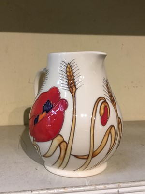 Lot 485 - Moorcroft pottery jug decorated with Poppies