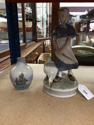 Lot 326 - Royal Copenhagen porcelain figure of a girl stood next to a swan, model number 527, and a small Royal Copenhagen vase (2)