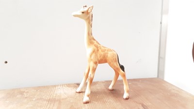 Lot 109 - Beswick Kangaroo, model no. 1160, designed by Arthur Gredington, 14.5cm high, together with a Beswick Panda, and a Giraffe (3)