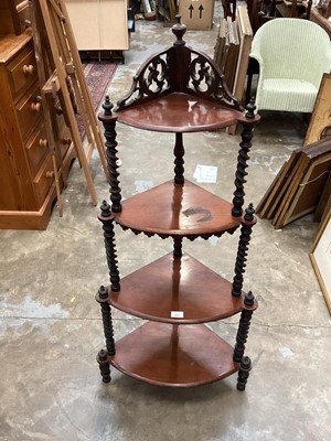 Lot 931 - Victorian mahogany graduated whatnot, together with a pole screen