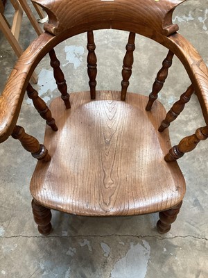 Lot 945 - Elm captains arm chair, together with an elm high back chair (2)