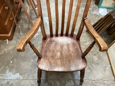 Lot 945 - Elm captains arm chair, together with an elm high back chair (2)