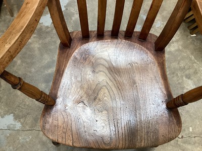 Lot 945 - Elm captains arm chair, together with an elm high back chair (2)