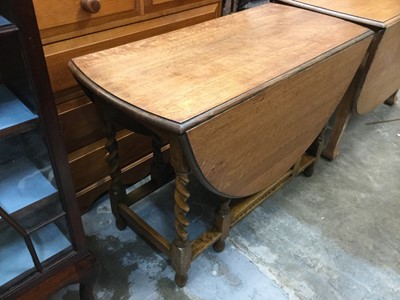 Lot 911 - 1920's / 30's Golden oak drop leaf table on barley twist legs