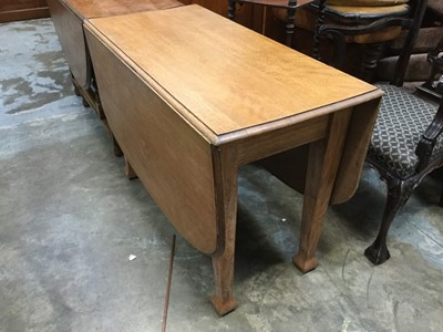 Lot 912 - 1920's / 30's Golden oak drop leaf dining table on bulbous feet