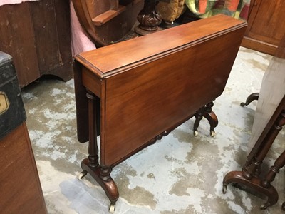 Lot 897 - Victorian mahogany Sutherland table on turned legs with ceramic casters