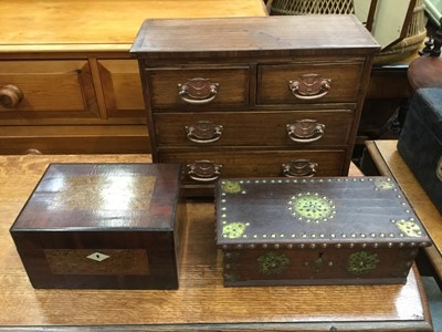 Lot 260 - Miniature chest of drawers, together with brass studded box and another box (3)