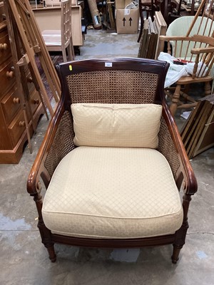 Lot 934 - Good quality bergere armchair with drop in seat and loose cushions on turned front legs