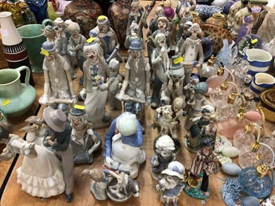 Lot 388 - Lot Lladro and other porcelain figures particularly clowns (33)