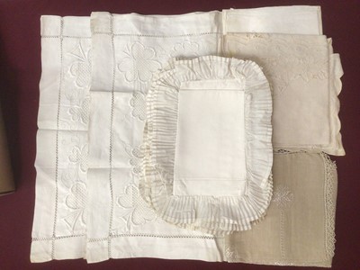 Lot 2195 - Two boxes of Edwardian embroidered and worked linens including frilled pillowcases, shamrock embroidered pillow slpips, pulled thread, cutout work and crochet trimmed items.  Plus a quantity of whi...