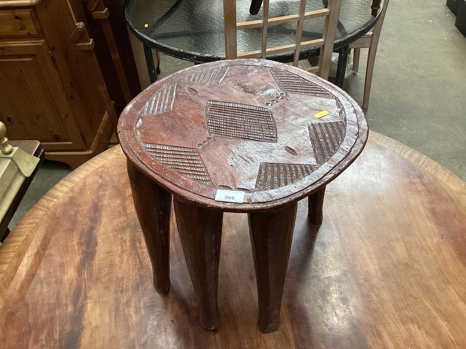 Lot 966 - African wooden stool with carved geometric pattern