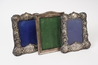 Lot 376 - Pair of Victorian silver photo frames, together with another silver frame (3)