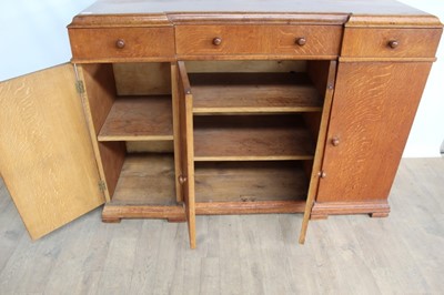 Lot 1443 - Suite of 1930s oak furniture in the manner of Heals, including refectory style table and sideboard